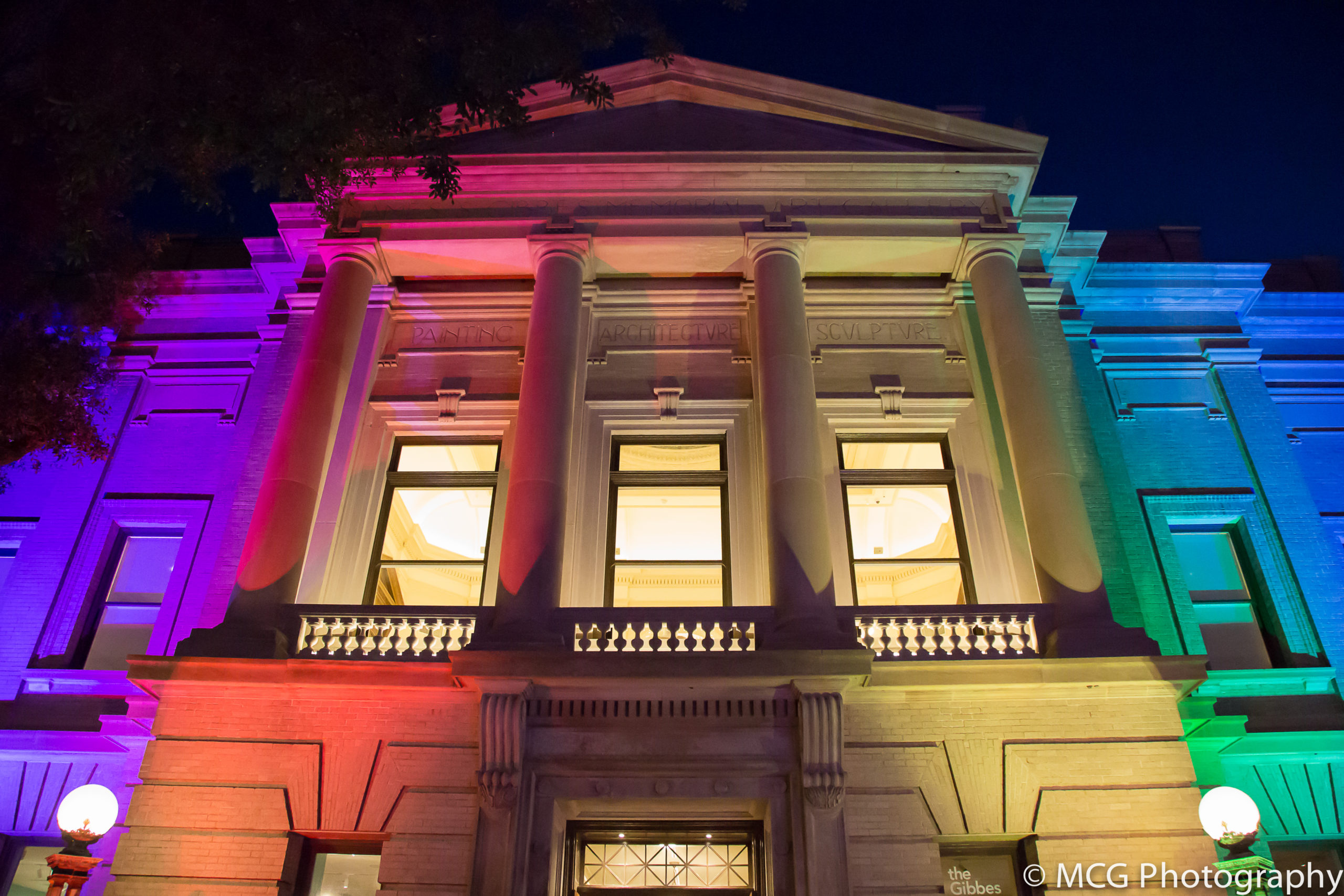 Gibbes Museum exterior in rainbow lights
